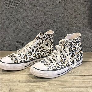 Converse Black and White High-Top Sneakers with pockets.